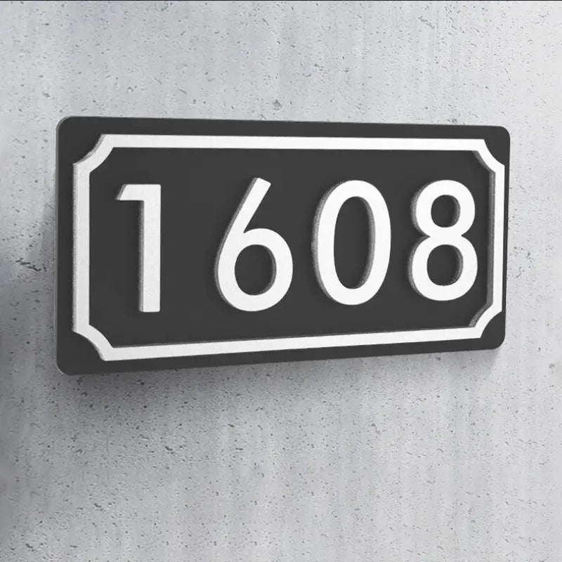 Hausnummernschild Familie