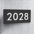 Hausnummernschild Familie