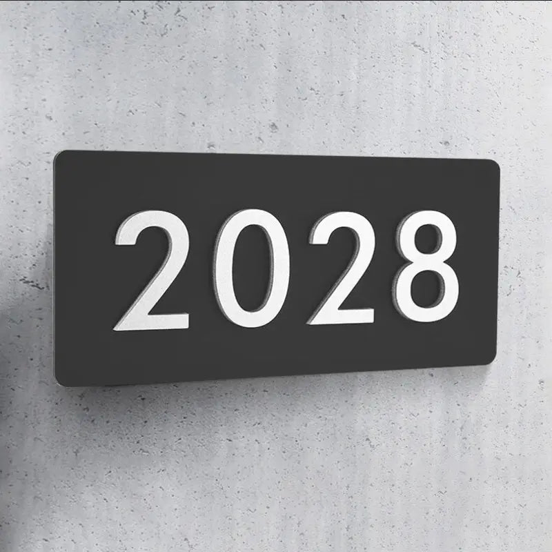 Hausnummernschild Familie